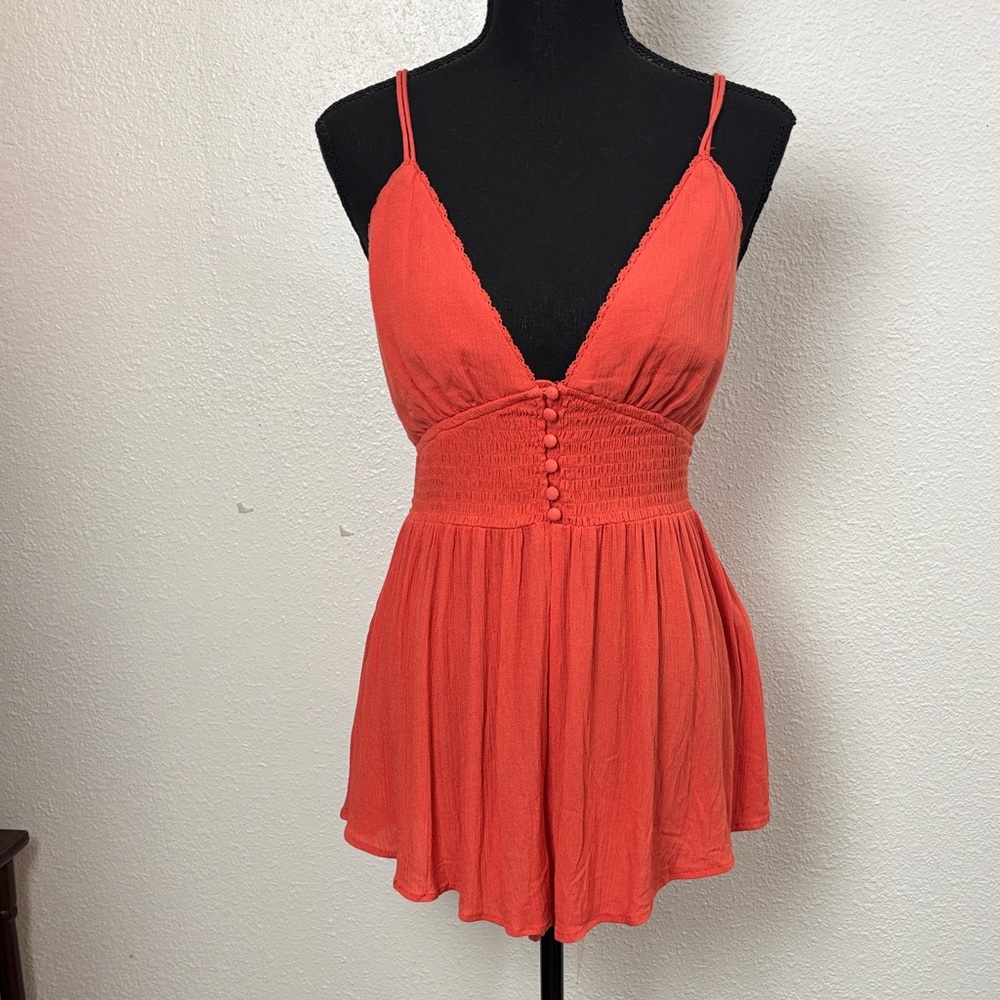 1549 Women's Coral Sleeveless Romper. She said the new